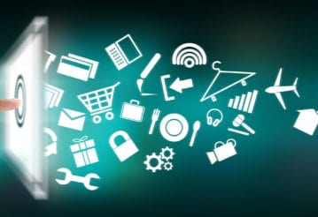 A hand touches an illustration of a computer tablet, making lots of icons fly out
