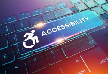 Computer drawn keyboard with large key depicting wheelchair and word "Accessibility"