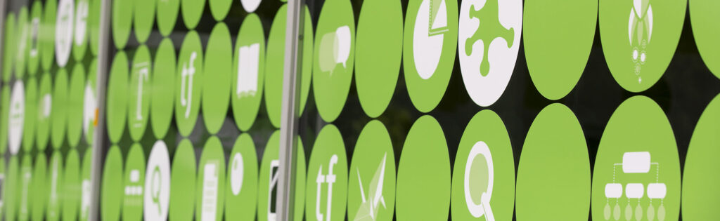 The outside window of Treefrog showing circular window decals