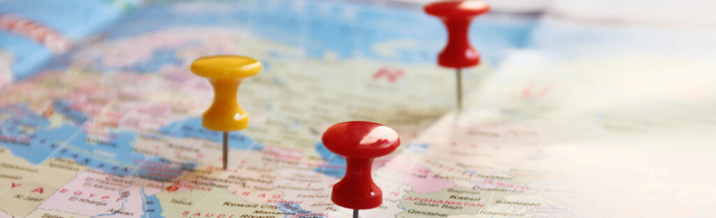Push pins on a map