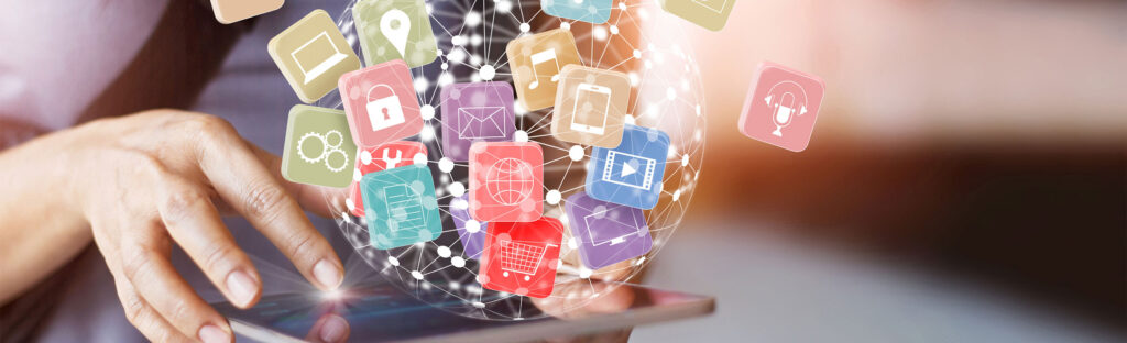 Close up of a woman's hands holding a computer tablet. Illustrated icons float in an orb above the tablet.